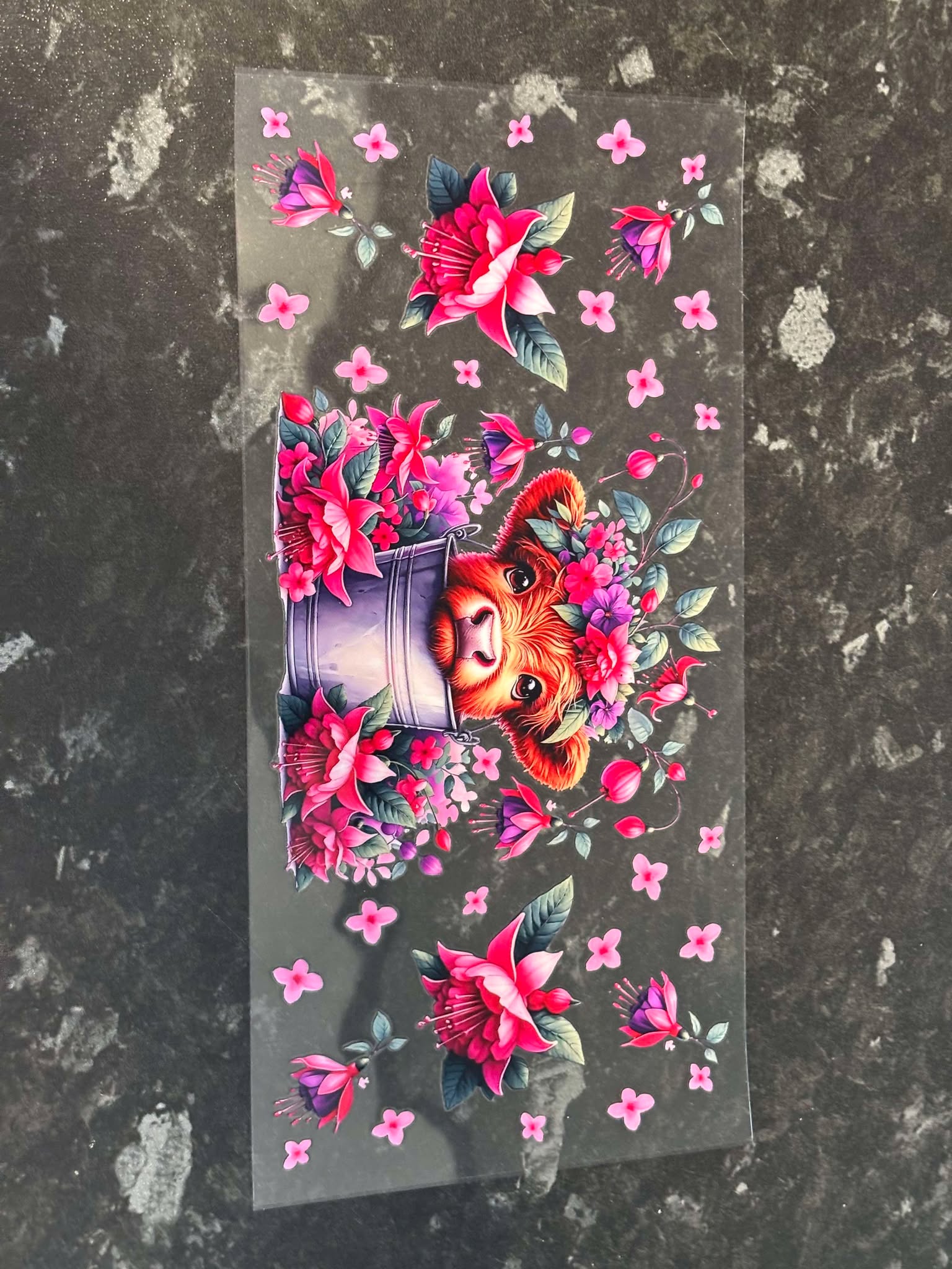 Cow with pink flowers